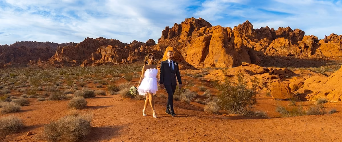 Wedding couple walking at Valley of Fire State Park